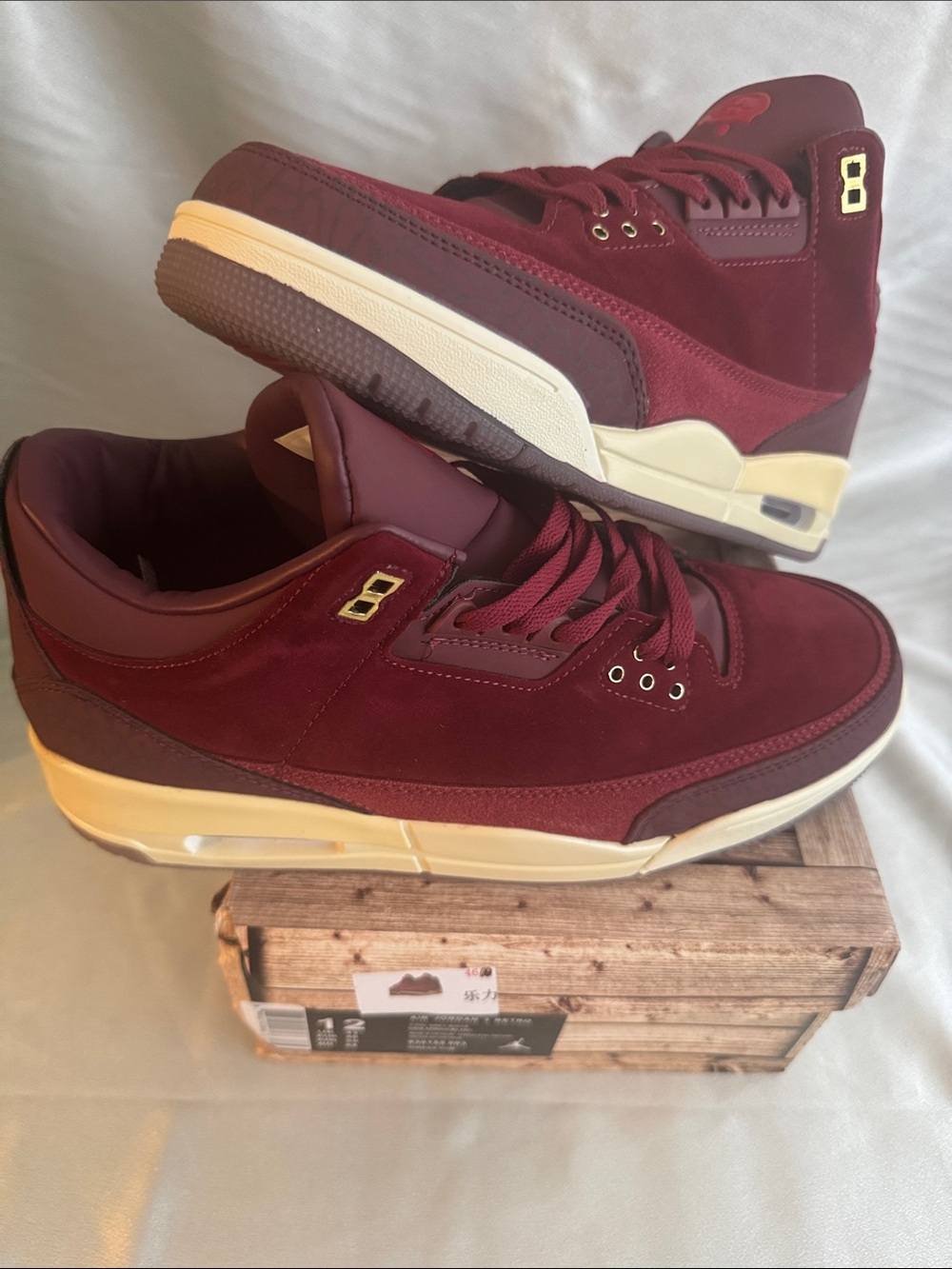 New! Air Jordan 3 Retro "Bin 23" features a rich Team Red nubuck and suede upper